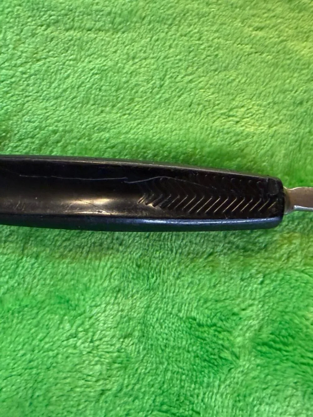 Vintage Black Slotted Metal Spatula with Plastic Handle